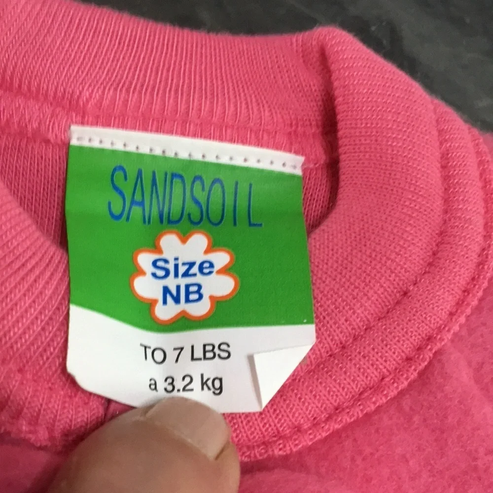 NWT Sandsoil, Newborn to 7 lb girls sleeping gown. Fully zip,